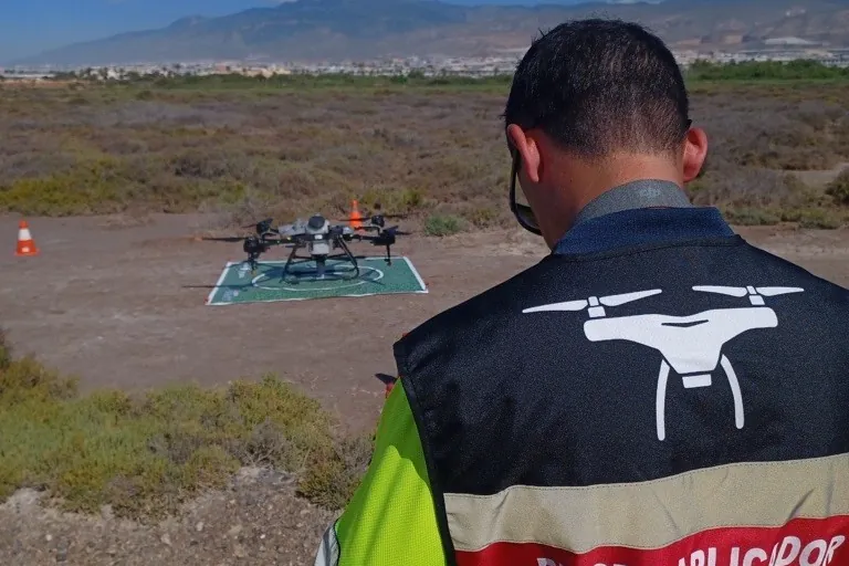 Drone pilot preparing a treatment flight
