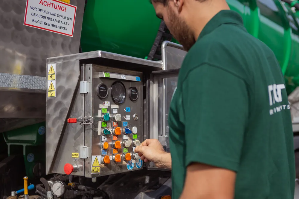 Operator at the control panel of a tanker