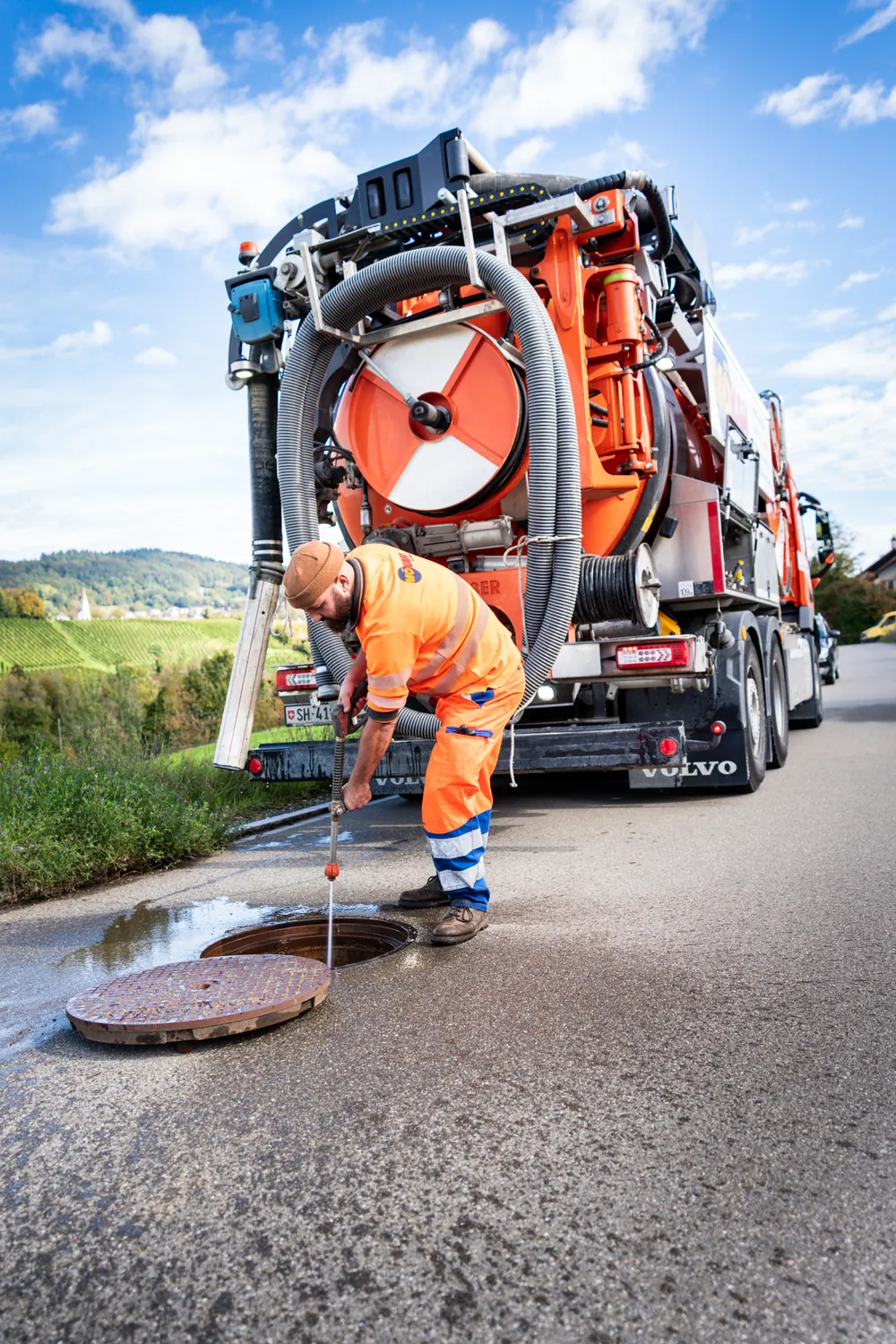 Sewer cleaning on a village road