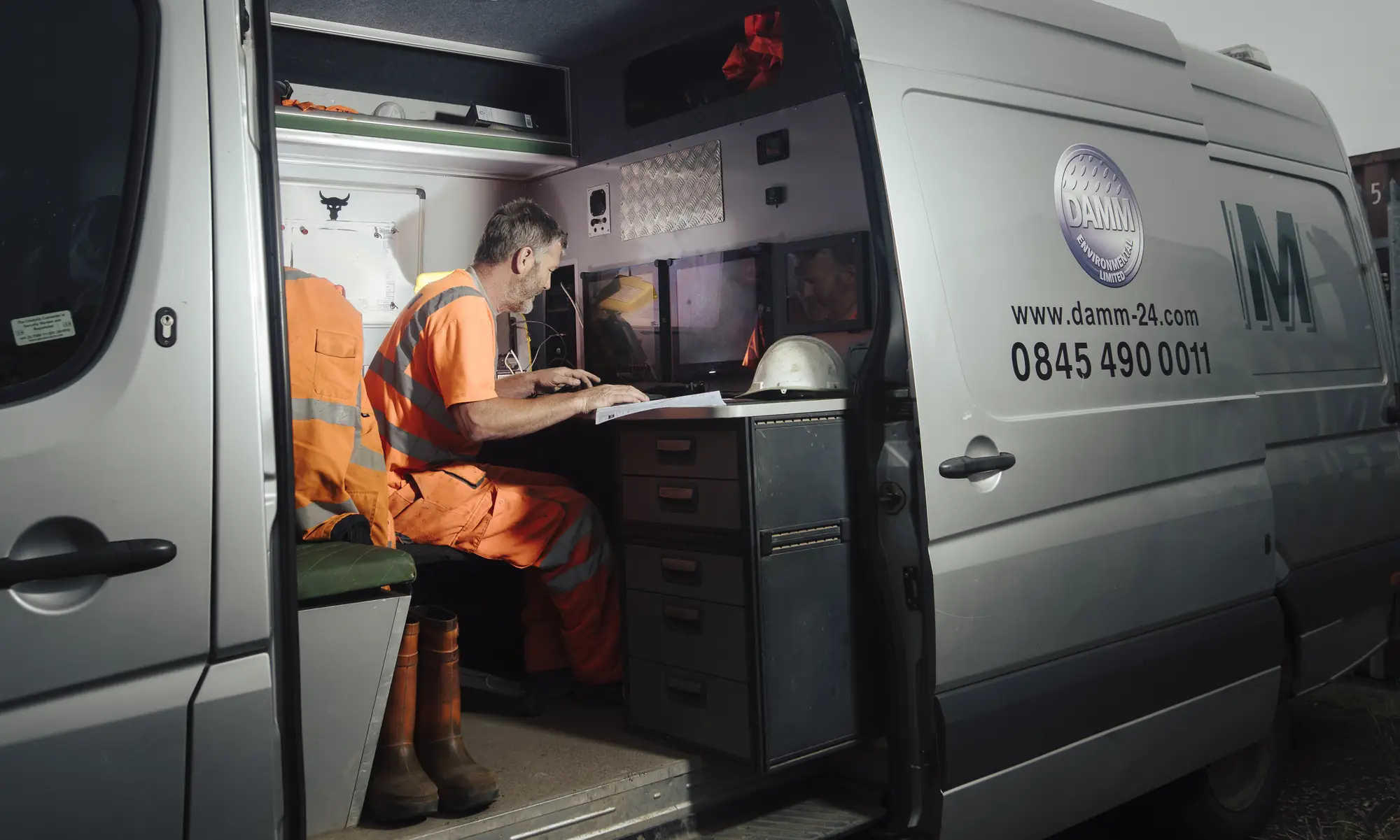KSG drainage specialist reviewing inspection footage in his CCTV van