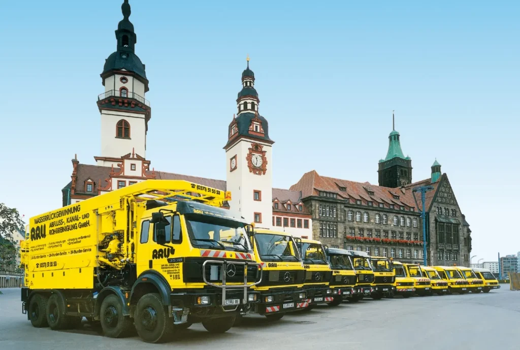 Fleet of RRU sewer-cleaning trucks in front of Chemnitz town hall