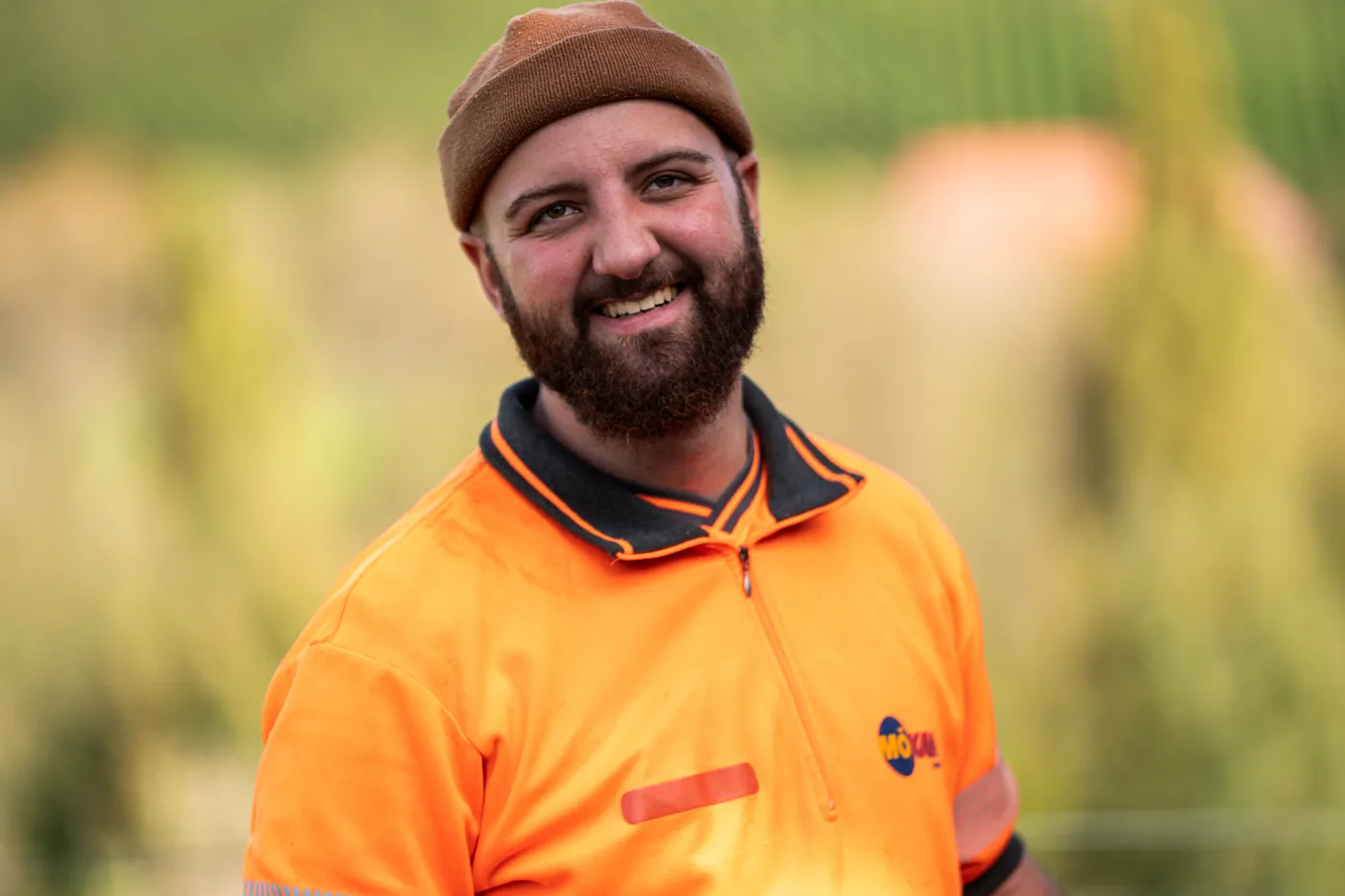 Smiling KSG sewer specialist on a job site